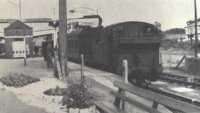 No 1451 taking water at Tiverton Junction after arrival from Hemyock, July 1962 No 1451 taking water at Tiverton Junction after arrival from Hemyock, July 1962